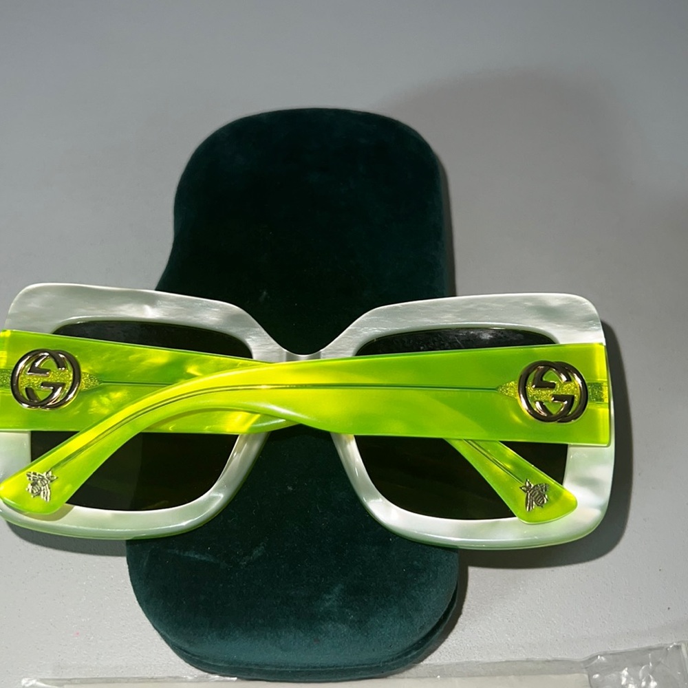 Green Gucci glasses